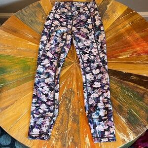Lululemon In Motion 23” Floral Leggings with Purple and Pink Flowers, size 2